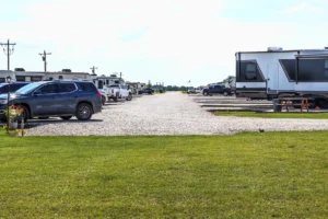 Pull-through RV site with full hookups at extended stay RV park in North Texas